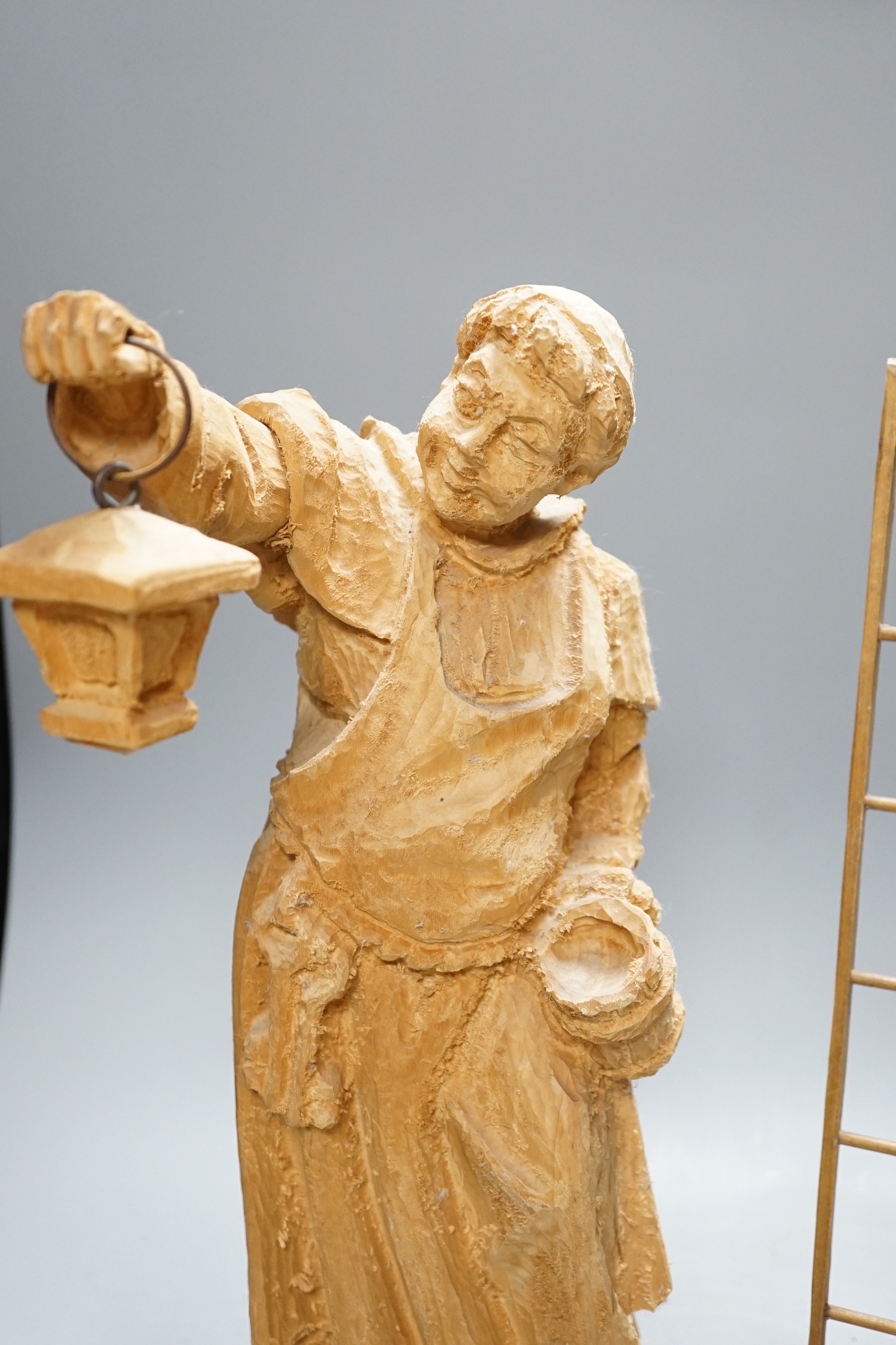 Two Black Forest carvings of a friar and a steeplejack, tallest 40cm